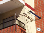 Tendedero y  cubre ropa instalación en balcón abierto
